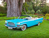 AUT 21 RK3153 01
1957 Chrysler 300C Indian Turquoise 3/4 Front View On Grass By Trees