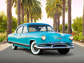 AUT 21 RK3170 01
1952 Kaiser Manhattan Turquoise And Blue 3/4 Front View On Pavement By Palm Trees