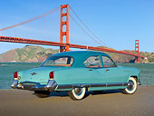 AUT 21 RK3174 01
1952 Kaiser Manhattan Turquoise And Blue 3/4 Rear View On Pavement By Golden Gate Bridge