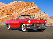 AUT 21 RK3184 01
1957 Cadillac El Dorado Barritz Red 3/4 Front View On Pavement By Red Rock
