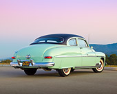AUT 21 RK3205 01
1950 Mercury Monterey Seafoam 3/4 Rear View On Pavement At Dusk
