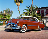 AUT 21 RK3221 01
1950 Pontiac Catalina Convertible Brown 3/4 Front View On Brick By Building And Fountain