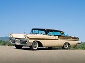 AUT 21 RK3223 01
1958 Mercury Turnpike Cruiser Tan And Brown 3/4 Front View On Pavement Against Blue Sky