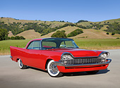 AUT 21 RK3239 01
1958 Chrysler Windsor Red 3/4 Front View On Pavement By Grassy Hills
