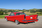 AUT 21 RK3240 01
1958 Chrysler Windsor Red 3/4 Rear View On Pavement By Grassy Hills