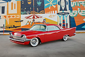 AUT 21 RK3242 01
1958 Chrysler Windsor Red 3/4 Front View On Pavement By Mural