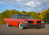 AUT 21 RK3243 01
1959 Pontiac Bonneville Orange 3/4 Front View On Pavement By Water And Trees