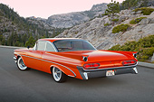 AUT 21 RK3248 01
1959 Pontiac Bonneville Orange 3/4 Rear View On Pavement In Mountains