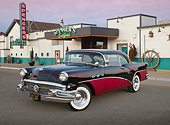 AUT 21 RK3266 01
1956 Buick Special Black And Fuschia 3/4 Front View On Pavement By Restaurant At Dusk