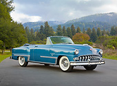 AUT 21 RK3278 01
1953 DeSoto Firedome French Blue 3/4 Front View On Pavement By Evergreen Trees And Hills