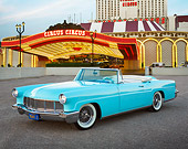 AUT 21 RK3300 01
1956 Lincoln Continental Mark 22 Light Blue 3/4 Front View On Pavement By Casino