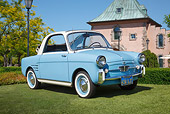 AUT 21 RK3303 01
1959 Fiat 500 Bianchina Light Blue 3/4 Front View On Grass By House