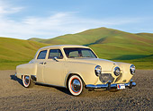 AUT 21 RK3311 01
1951 Studebaker Champion Yellow 3/4 Front View On Gravel By Grassy Hills