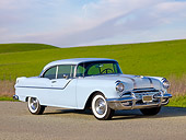 AUT 21 BK0001 01
1955 Pontiac Chieftan White 3/4 Front View On Pavement By Hills