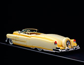 AUT 21 RK0153 08
1953 Cadillac Eldorado Convertible Yellow 3/4 Rear On Gray Line Brake Lights On Studio Background