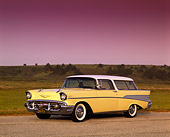 AUT 21 RK0163 02
1957 Chevy Nomad Wagon Yellow 3/4 Side View On Pavement