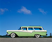 AUT 21 RK0236 02
1957 White And Green Ford Station Wagon Profile On Pavement Blue Sky