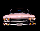 AUT 21 RK0260 04
1959 Pink Cadillac DeVille Head On View Headlights On Studio Background