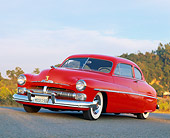 AUT 21 RK0325 01
1950 Red Mercury Slanted 3/4 Front View On Pavement