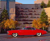AUT 21 RK0343 01
1954 Red Desoto Coupe Adventurer II Side View On Pavement In Front Of Building