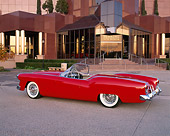 AUT 21 RK0350 04
1953 Red Plymouth Belmont Convertible 3/4 Rear View On Pavement In Front Of Museum