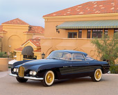 AUT 21 RK0355 03
1953 Black Cadillac Ghia Coupe 3/4 Front View In Front Of Building At Dusk