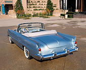 AUT 21 RK0384 03
1957 Dual Ghia Convertible Blue 3/4 Rear View In Front Of Museum