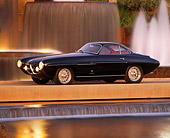 AUT 21 RK0387 01
1953 Fiat Ghia 8V Supersonic Coupe Black 3/4 Front View By Fountain Headlights On