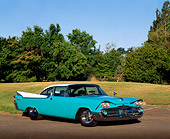 AUT 21 RK0460 09
1959 Dodge Coronet Turquoise 3/4 Front View On Pavement By Grass And Trees Blue Sky