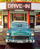 AUT 21 RK0485 02
1955 Green And Ivory Chevy Bel Air Head On View On Wet Pavement In Front Of Diner Headlights On