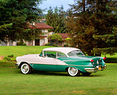AUT 21 RK0528 05
1956 Oldsmobile Super 88 Green & White 3/4 Rear View On Grass