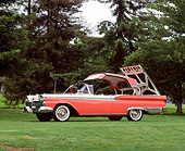 AUT 21 RK0530 01
1959 Ford Galaxie Skyliner Roof Retracting 3/4 Front View On Grass By Trees