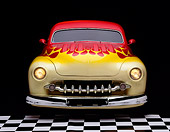 AUT 21 RK0537 09
1950 Red/Yellow Custom Mercury, head on in studio with checkerboard floor
