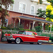 AUT 21 RK0580 03
1959 Ford Fairlane Retractable Red Low 3/4 Side View On Pavement In Front Of House