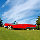 AUT 21 RK0584 02
1959 Ford Fairlane Retractable Red Side View On Grass Blue Sky