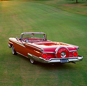 AUT 21 RK0588 01
1959 Ford Fairlane Retractable Red Overhead 3/4 Rear View On Grass Brake Lights On At Dusk