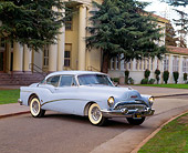 AUT 21 RK0642 05
1953 Buick Skylark Hardtop Light Blue 3/4 Front View On Pavement By Trees And Building