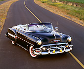 AUT 21 RK0647 03
1953 Chevrolet Bel Air Convertible Black Overhead Front 3/4 View On Road