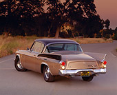 AUT 21 RK0657 05
1958 Studebaker Golden Hawk 3/4 Rear View On Pavement Trees Filtered