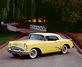 AUT 21 RK0669 02
1954 Buick Skylark Model 100 Convertible Yellow 3/4 Side View On Pavement By Bridge