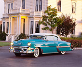 AUT 21 RK0760 02
1954 Chevrolet Bel Air Turquoise And White 3/4 Side View On Pavement By House