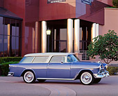 AUT 21 RK0792 02
1955 Chevy Nomad Wagon Blue 3/4 Front View On Pavement By Building