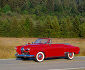 AUT 21 RK0816 17
1950 Studebaker Convertible Red 3/4 Side View On Road