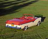 AUT 21 RK0818 07
1956 Ford Fairlane Sunliner Convertible Red & White Overhead 3/4 Rear View On Grass