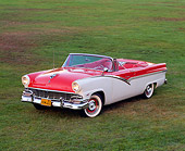 AUT 21 RK0822 07
1956 Ford Fairlane Sunliner Convertible Red & White 3/4 Front View On Grass Headlights On