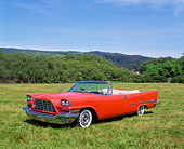 AUT 21 RK0906 06
1957 Chrysler 300 C Convertible Gougan Red 3/4 Front View On Grass
