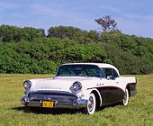 AUT 21 RK0911 06
1957 Buick Special Black And White 3/4 Front View On Grass By Trees Blue Sky