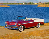 AUT 21 RK0969 05
1956 Chevrolet Bel Air Convertible Burgundy And White Overhead 3/4 Side View By Water Mountain Background