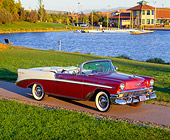 AUT 21 RK0973 10
1956 Chevrolet Bel Air Convertible Burgundy And White Overhead 3/4 Side View By Water And Grass