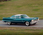 AUT 21 RK0999 04
1957 Chrysler Imperial Crown Coupe Teal 3/4 Side View On Road By Grass Hill